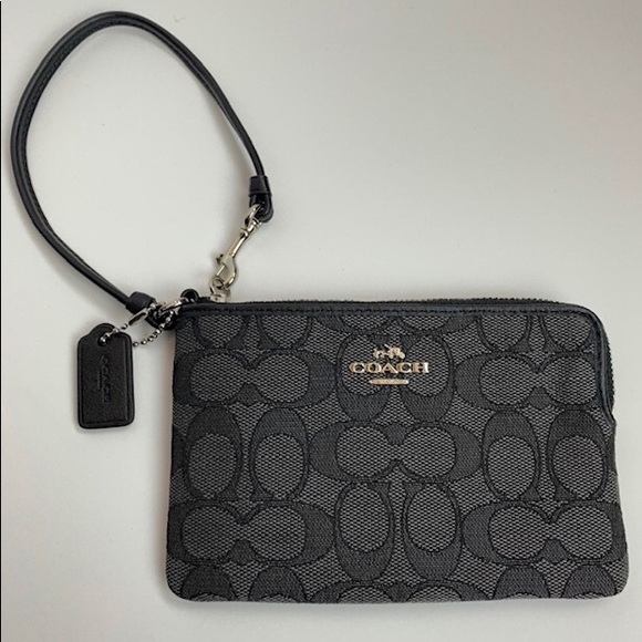 Coach Handbags - Signature Coach Wristlet. New. Never used